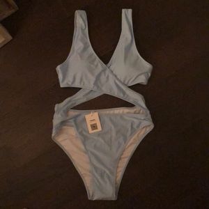 Brand new, pale blue cut out one-piece bikini